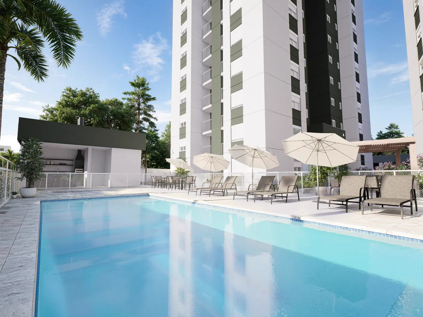 Piscinas adulto e infantil do Residencial Petra Novo Hamburgo com deck e espreguiçadeiras